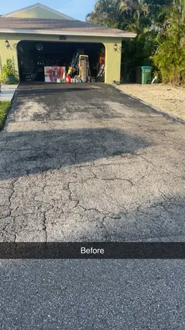 Before asphalt repair showing cracked driveway in Cape Coral