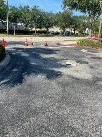 Traffic cones marking a work area on a commercial road