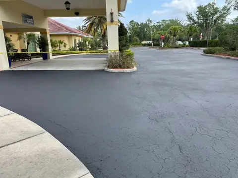Well-maintained parking area with clear lines and signage