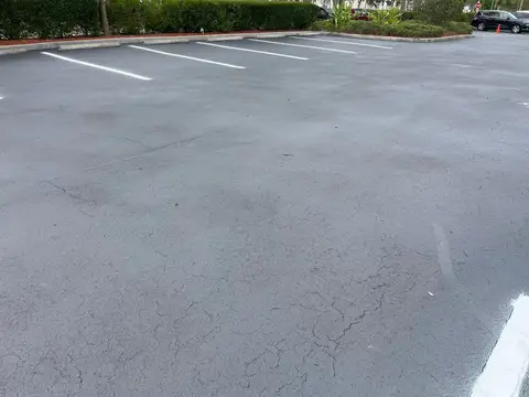 Pressure washing driveway at a residential property in Cape Coral